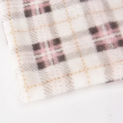 Rutigt tryckt flanellkoralltyg