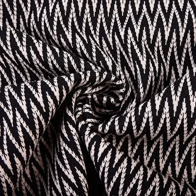 Dubbelt jacquardstickat tyg