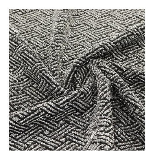 Filigran Jacquard stickat tyg