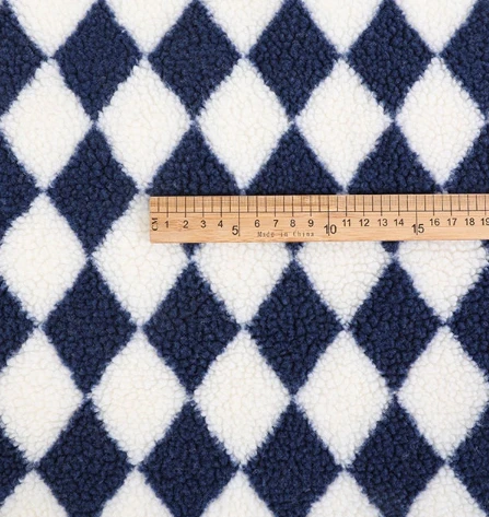En sida trycker sherpa fleece tyg för plagg
