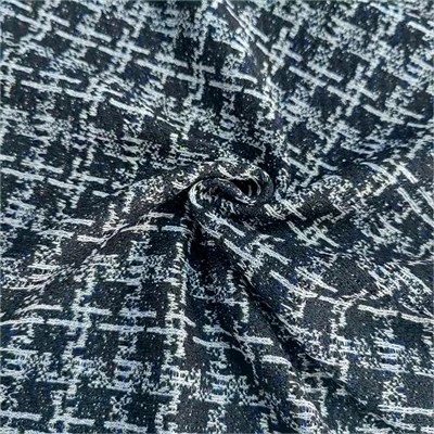 Stickat jacquardtyg till klänning